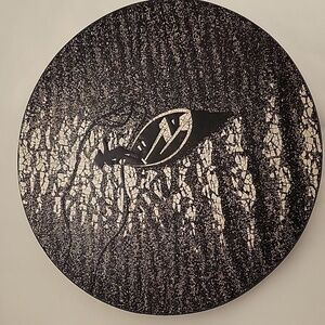 Laquered Paint on Eggshell Pattern "Man on Boat".  Plate w/hanger.       9 1/2"